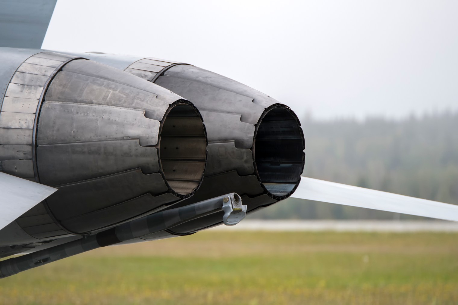 adobestock_311085975 Twin variable exhaust nozzles on a military fighter, illustrating FADEC and engine control software for defense